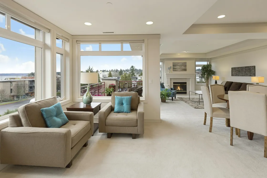 Bright open-plan living and dining room with large windows